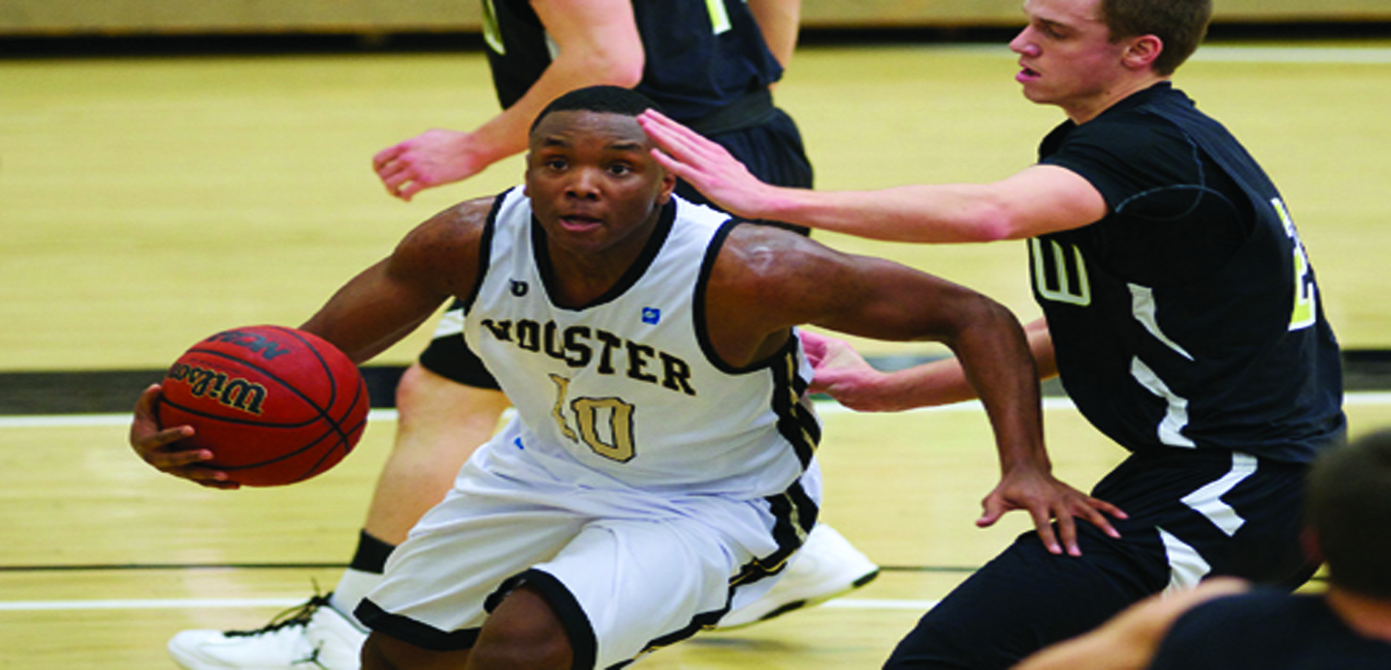 Men’s basketball outlasts OWU